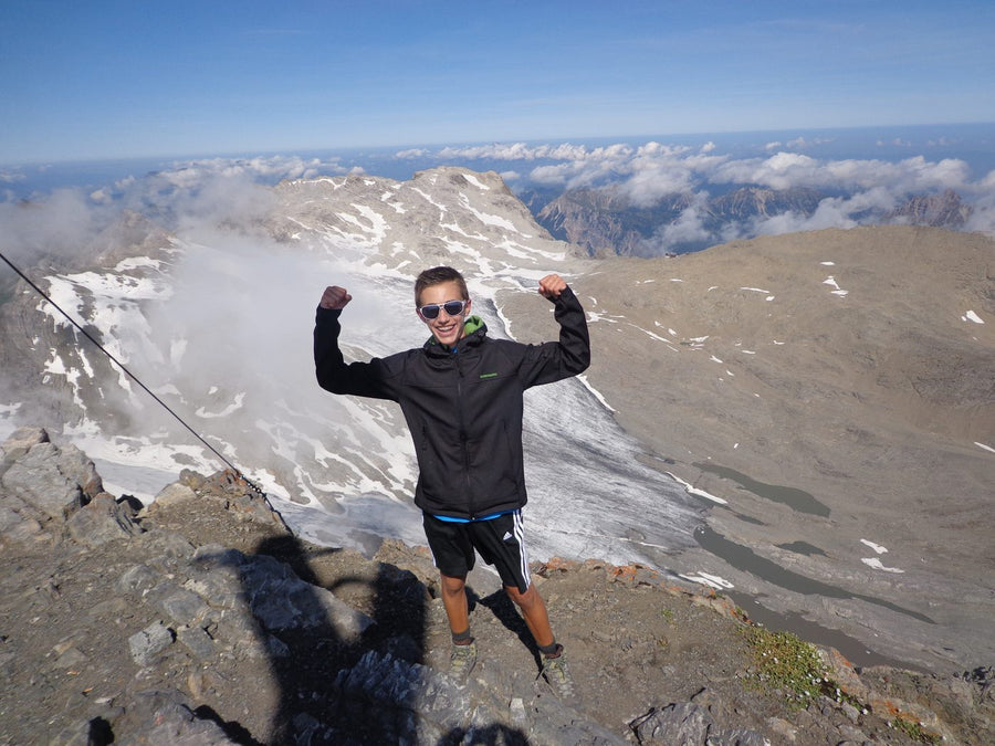 Teenage Lucas cheering on a summit