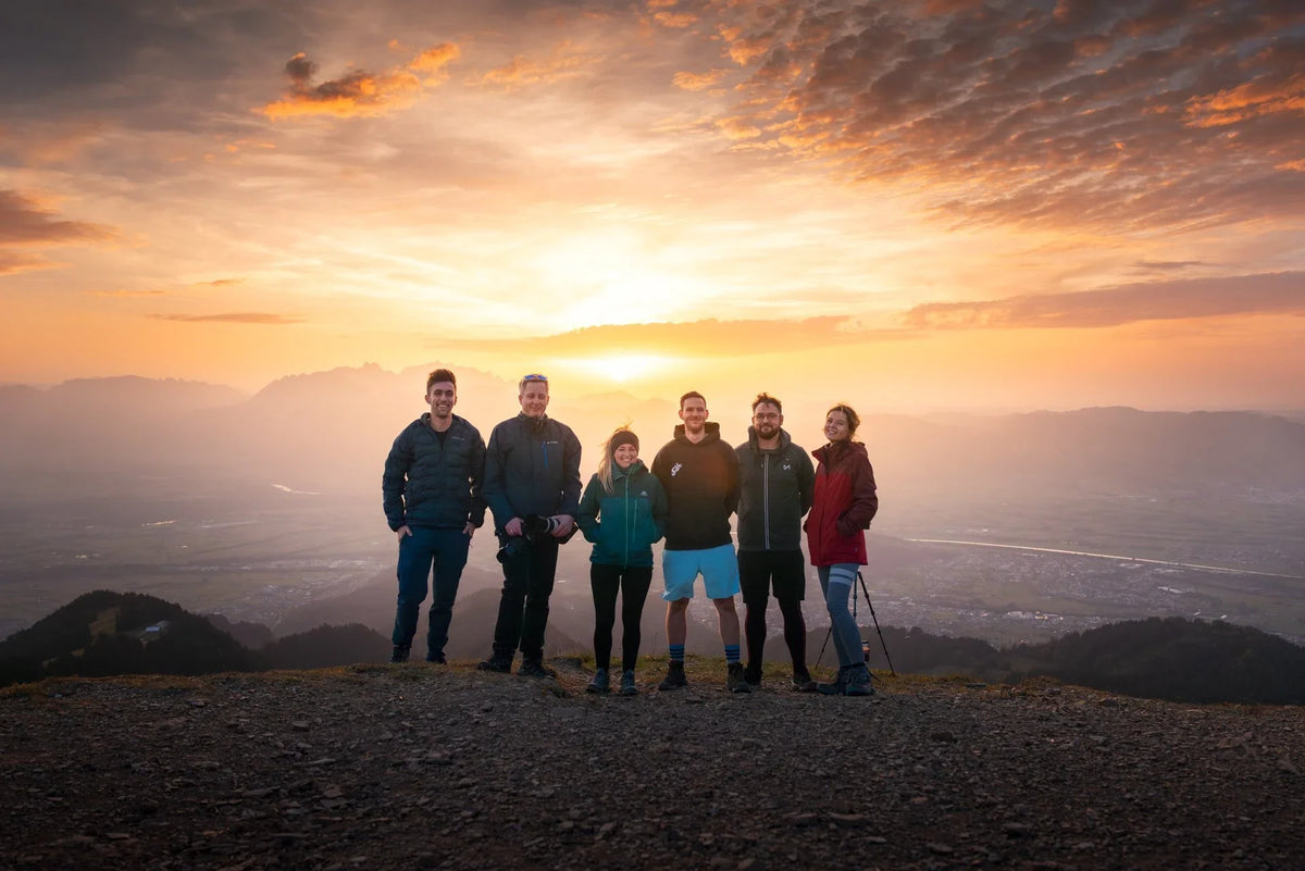 Community adventure, sunset hike to the Hohe Kugel in Saharan dust light, Vorarlberg