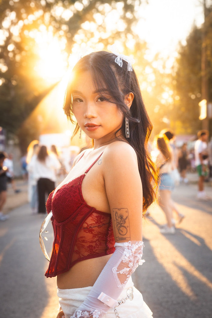 Portrait of a festival visitor in backlight on the festival road