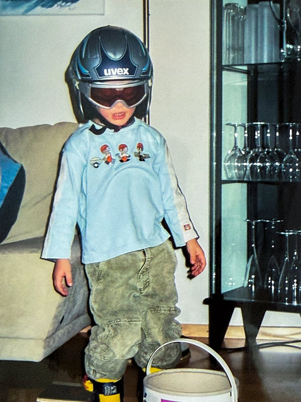 Lucas as a kid in the mountains