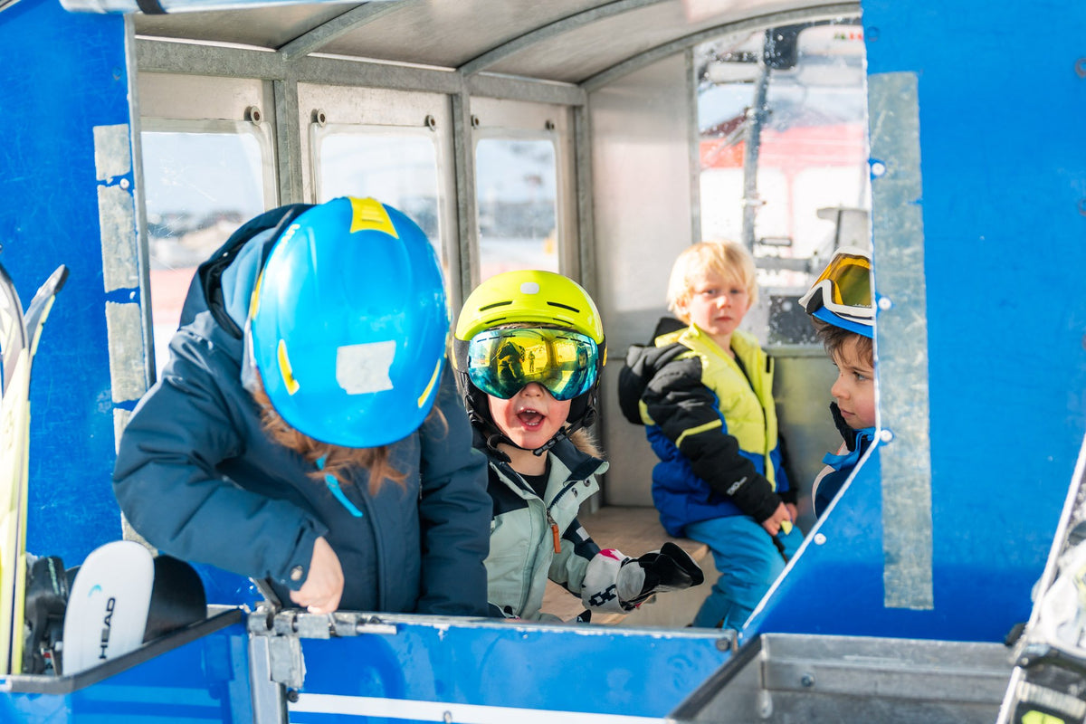 Children laughing inside the Kinderland lift