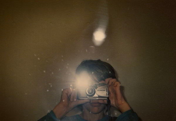 Young Lucas with the Olympus